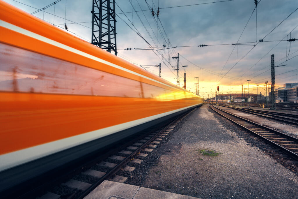 High Speed Passenger Train On Railroad Track In Motion